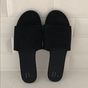 Black slip on sandals